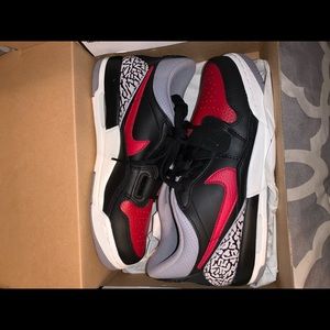 Red and black Jordan legacy 312 low